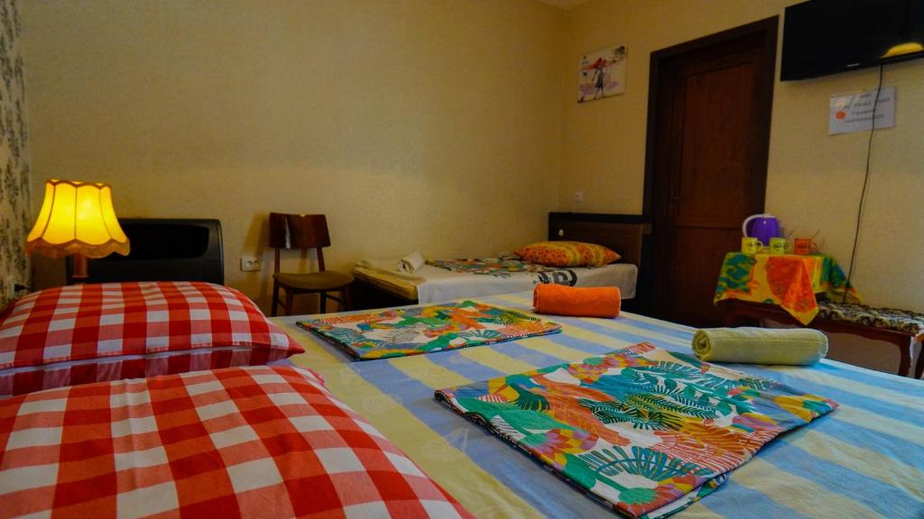 Postel nebo postele na pokoji v ubytování Guesthouse Vashlovani