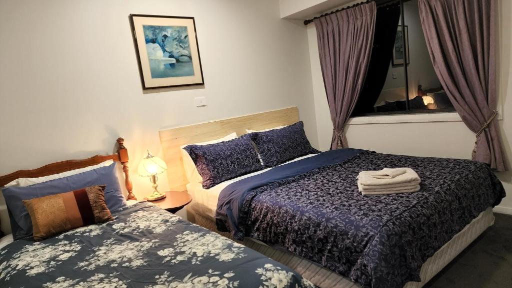 Letto o letti in una camera di Gowrie Agapanthus