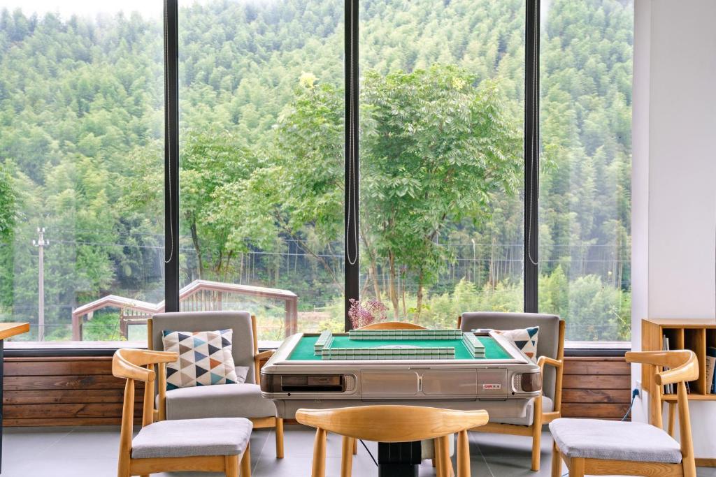 Fotografie z fotogalerie ubytování Moganshan Naicang Boutique Hotel v destinaci Deqing