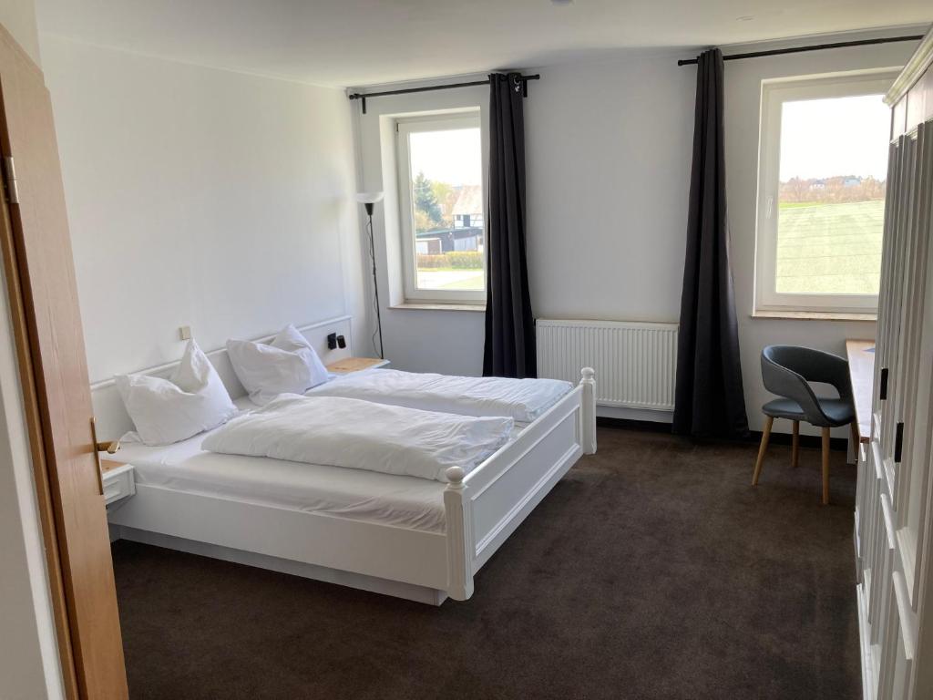 Postel nebo postele na pokoji v ubytování Room-24 - Zellwald