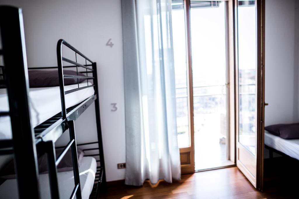 Postel nebo postele na pokoji v ubytování B&B Best Hostel Milano