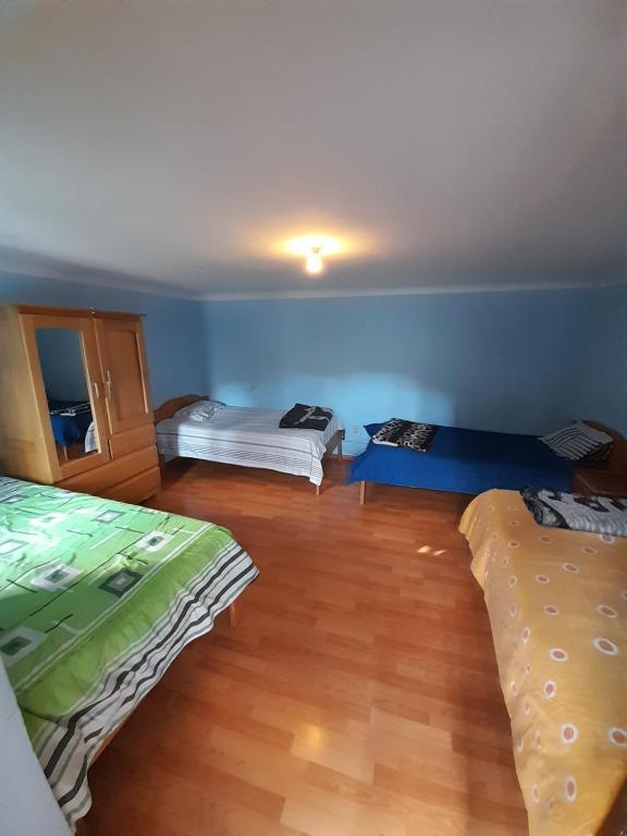 Ένα ή περισσότερα κρεβάτια σε δωμάτιο στο Hostel Rivendell Cusco