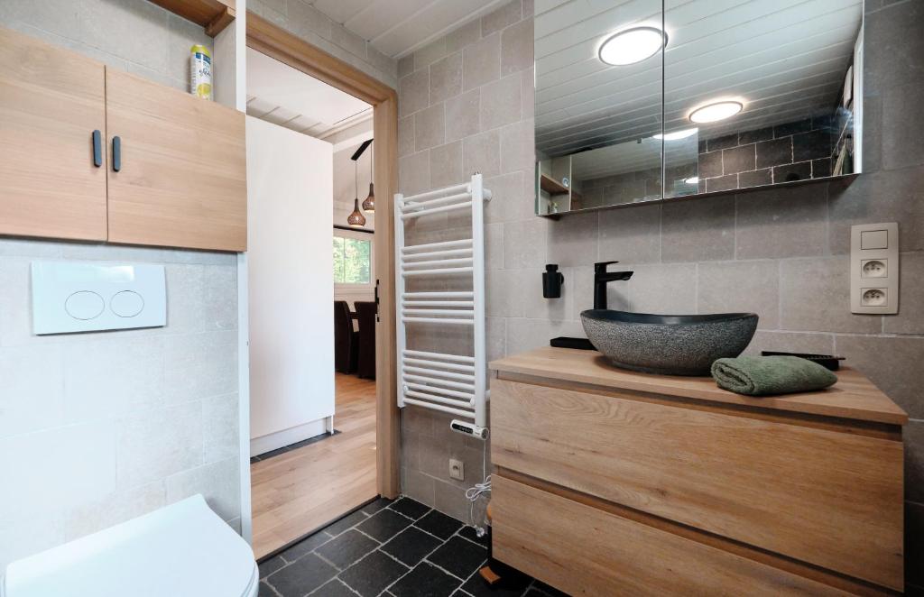 Kuchyň nebo kuchyňský kout v ubytování Chalet D'un Ami