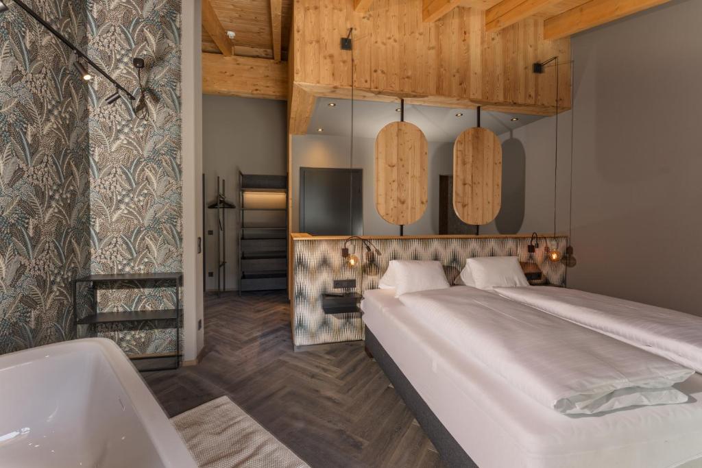 Postel nebo postele na pokoji v ubytování Apartmentresort MyLodge