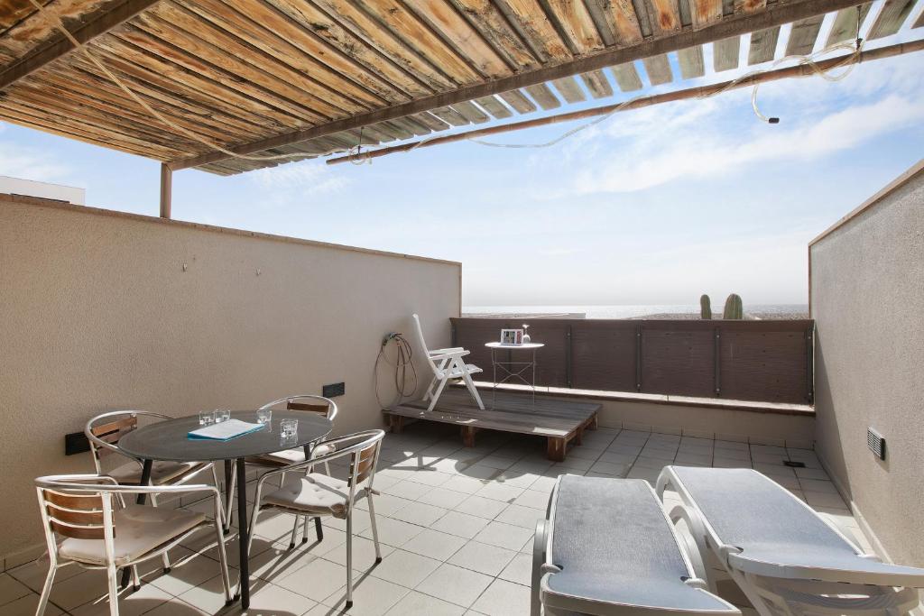 Posedenie v ubytovaní Casa Médano 25 en el Médano