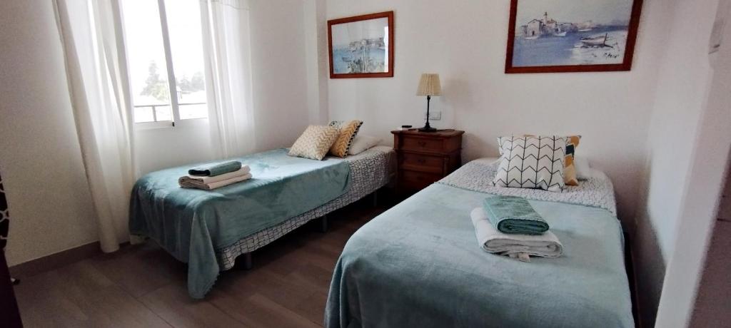 A bed or beds in a room at AP341 - Capri