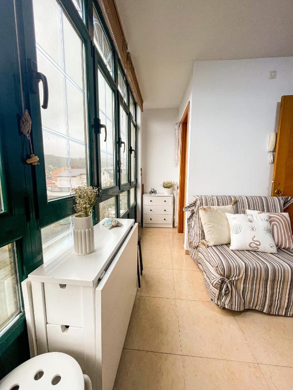 A bed or beds in a room at Apartamentos Sapoconcho by ALÔGA