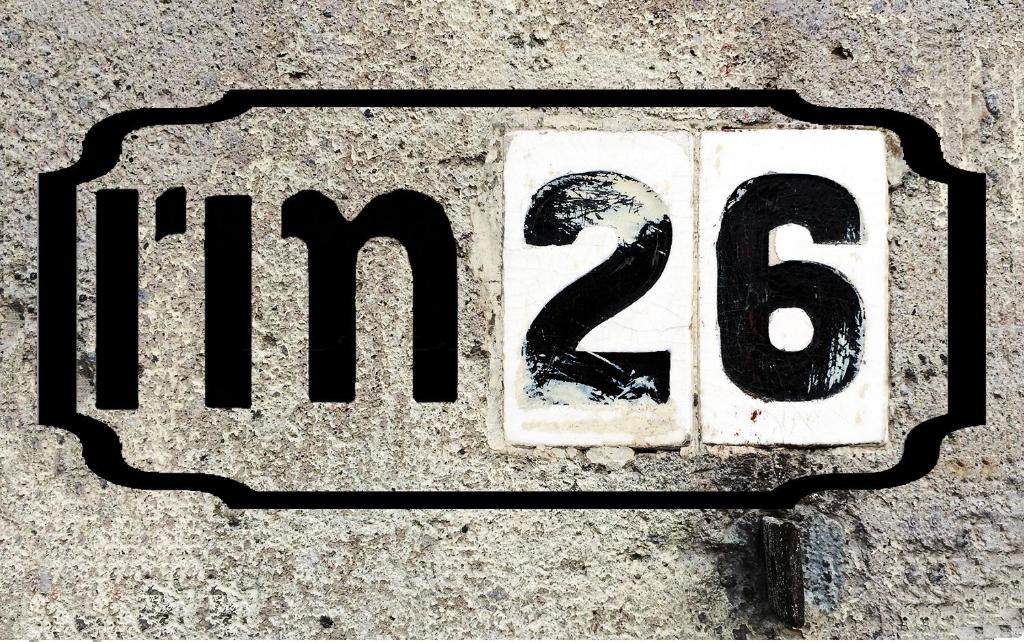 a street sign with the number eight on the street at Casa RM26 CoLiving & Travel Roma Norte, CDMX in Mexico City