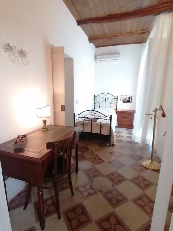 Postel nebo postele na pokoji v ubytování B&B Palazzo Lanza
