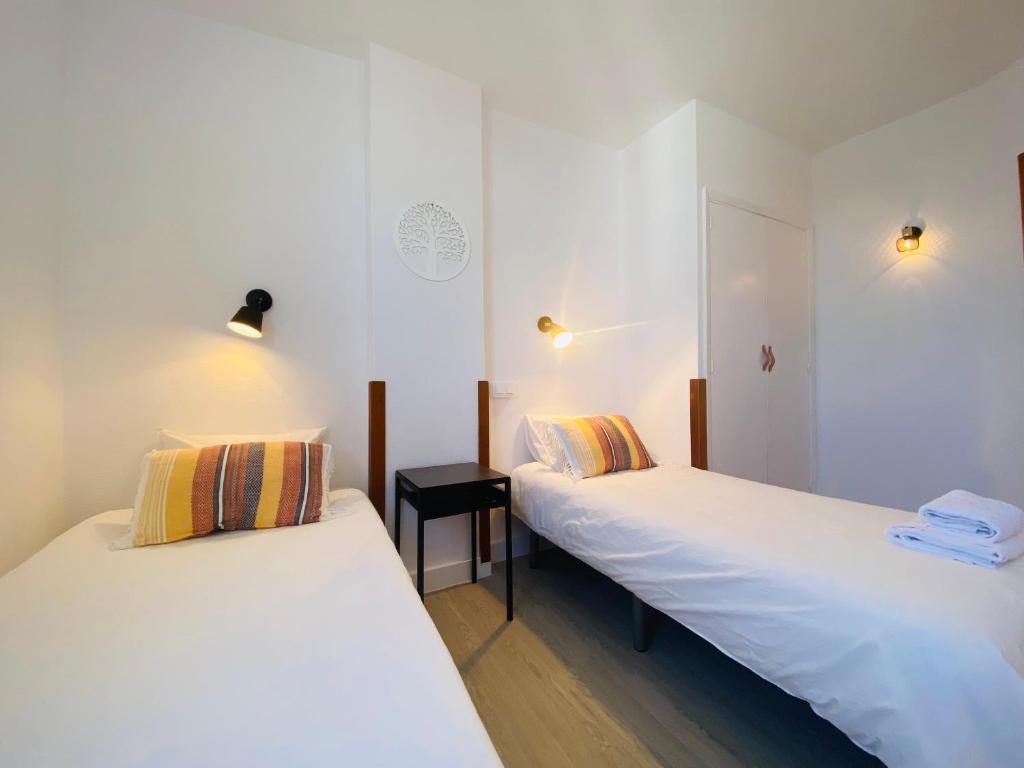 Postel nebo postele na pokoji v ubytování PARADISE HOLIDAYS 2 BEDROOMS & SEA VIEW, Tenerife