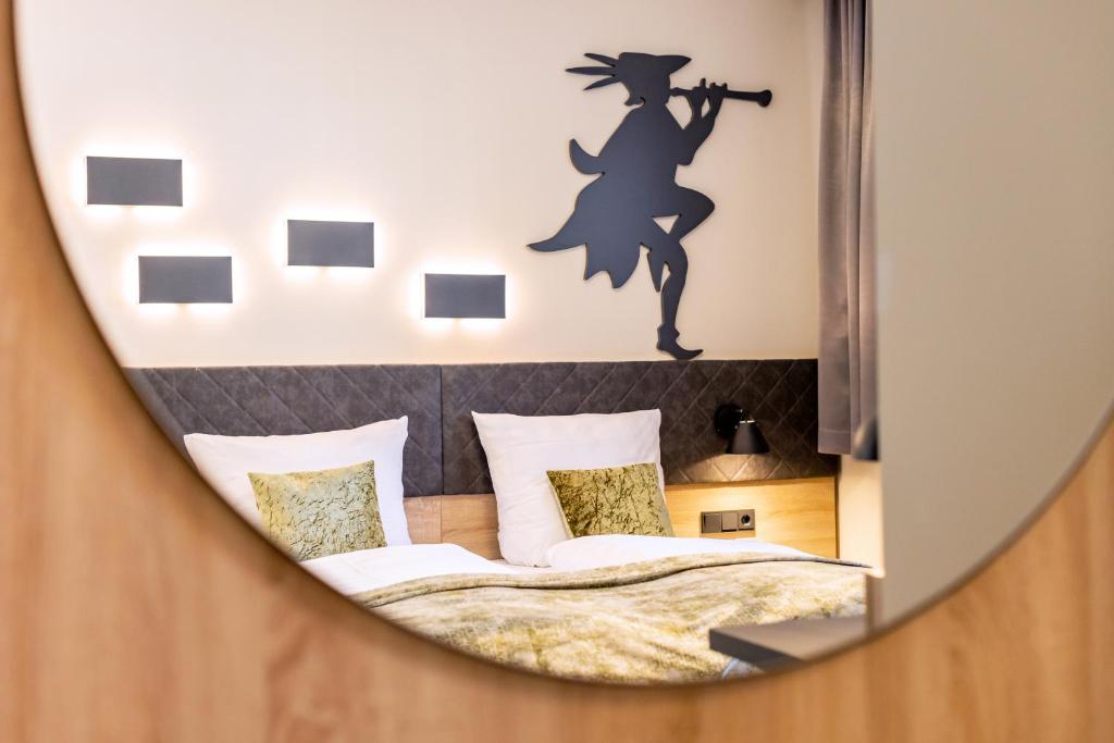 Postel nebo postele na pokoji v ubytování Hotel zur Börse
