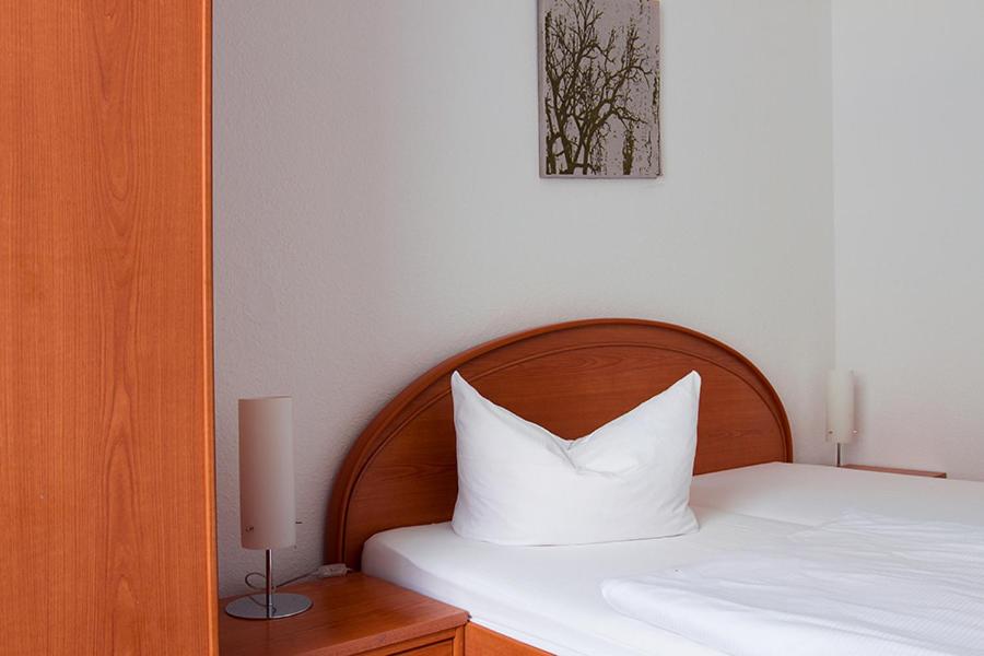 Postel nebo postele na pokoji v ubytování Hotel Eckstein