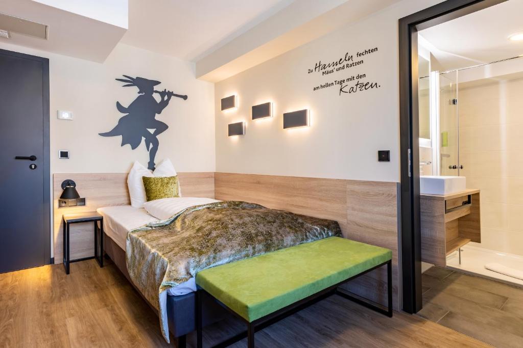 Postel nebo postele na pokoji v ubytování Hotel zur Börse