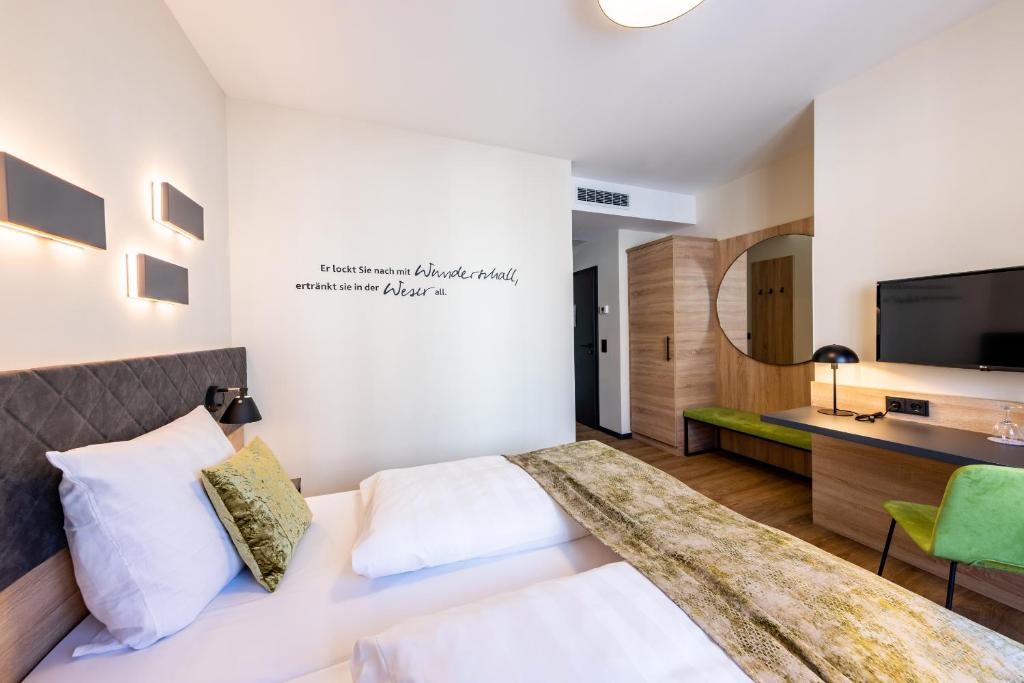 Postel nebo postele na pokoji v ubytování Hotel zur Börse