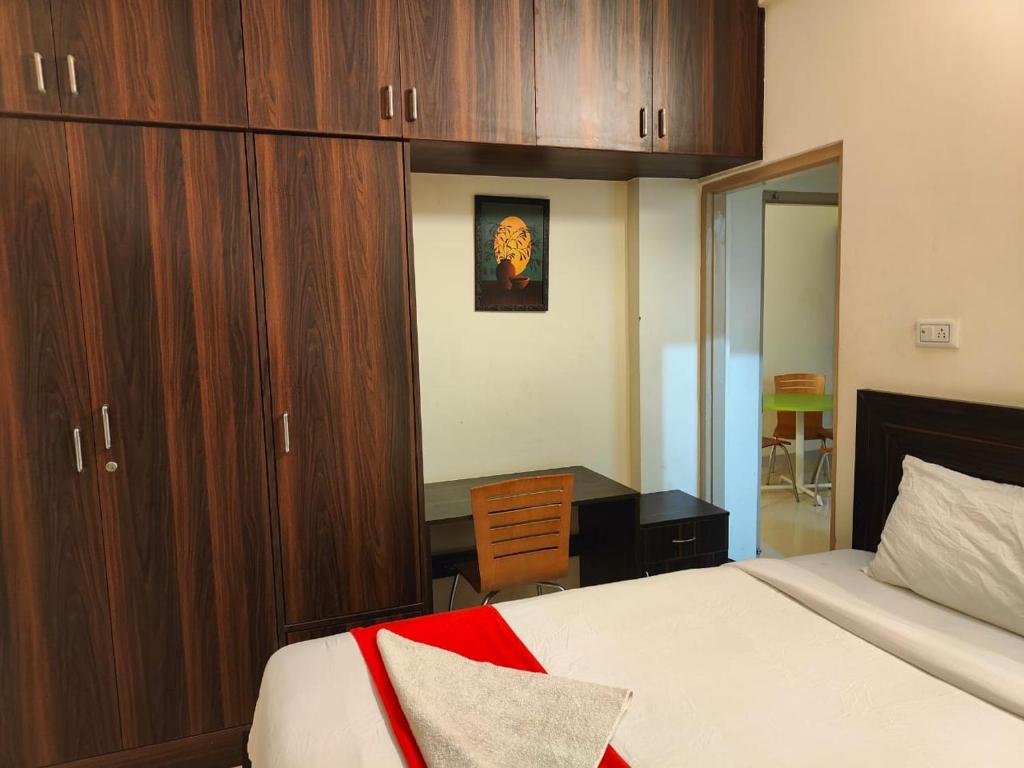 Postel nebo postele na pokoji v ubytování Pristine Inn Manyata