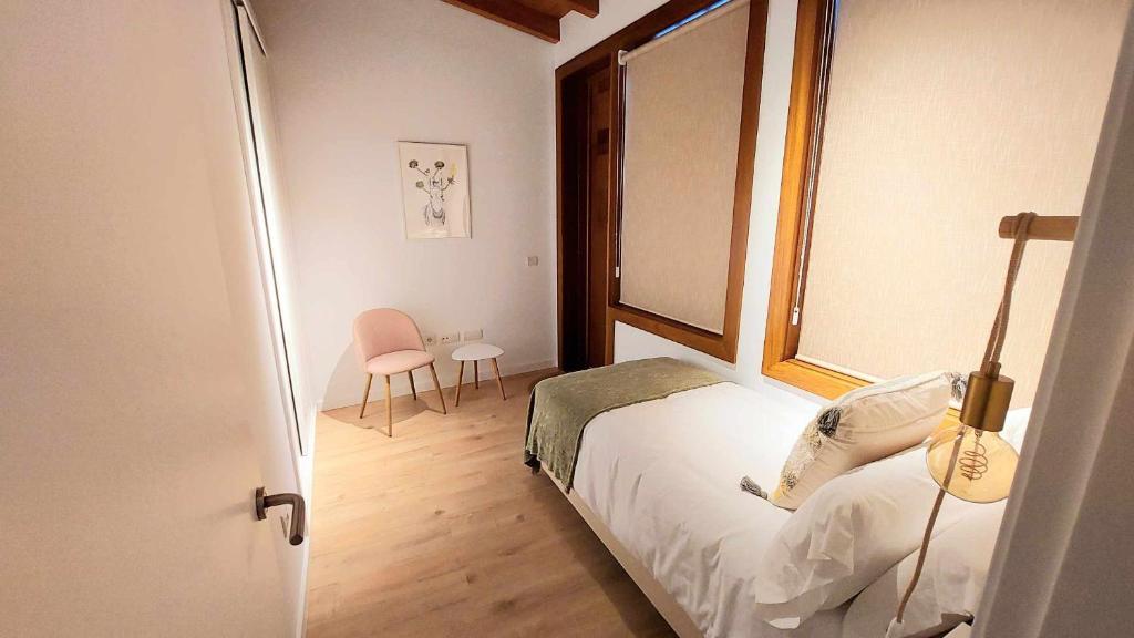 Postel nebo postele na pokoji v ubytování Los Adelantados La Hornacina Live Canarias