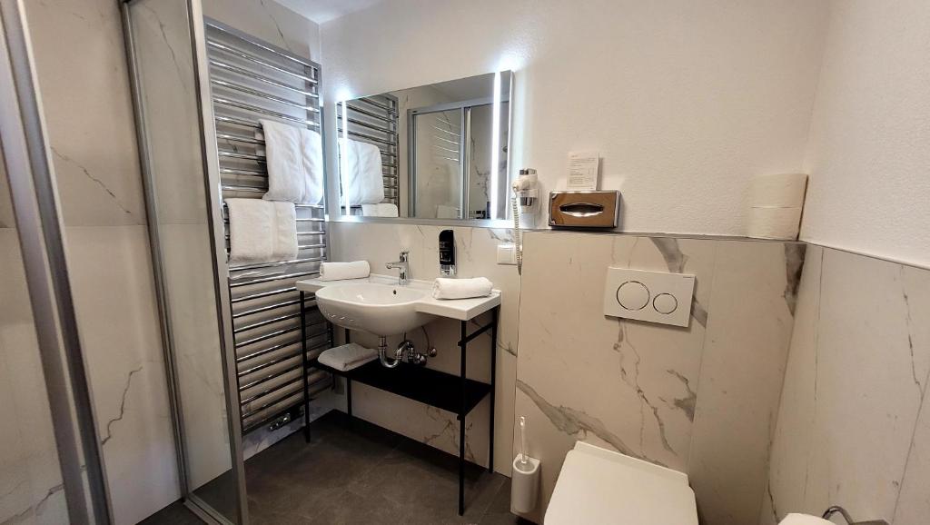 Koupelna v ubytování Hotel Garni Birkenhof
