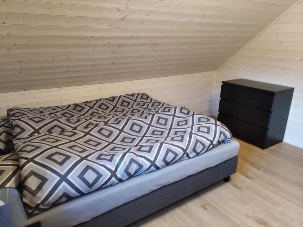 Posteľ alebo postele v izbe v ubytovaní Sowi Stok