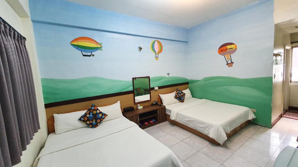 Postel nebo postele na pokoji v ubytování Lang Jiao Ya She Homestay