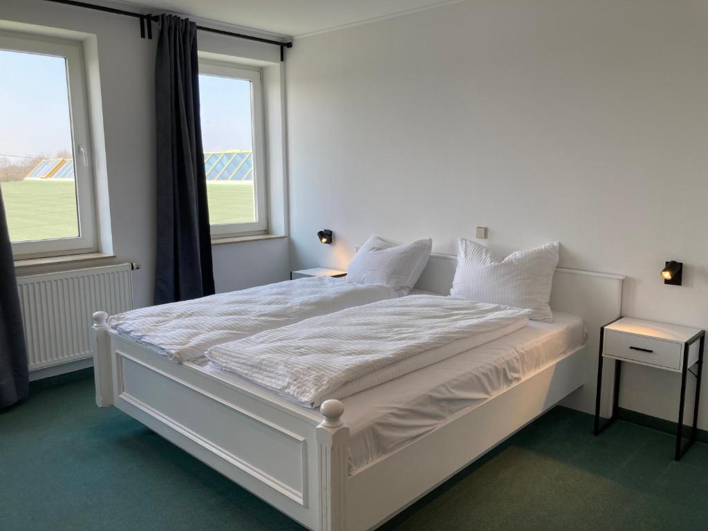 Postel nebo postele na pokoji v ubytování Room-24 - Zellwald