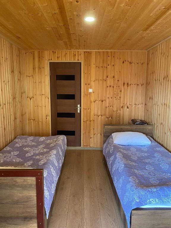 Postel nebo postele na pokoji v ubytování Guest House Gordila