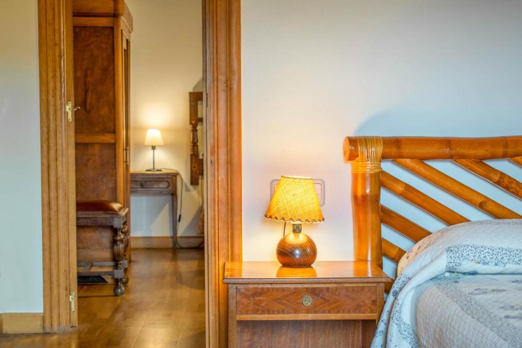 Postel nebo postele na pokoji v ubytování Casa Monaut, acogedores apartamentos a los pies de la selva de Irati