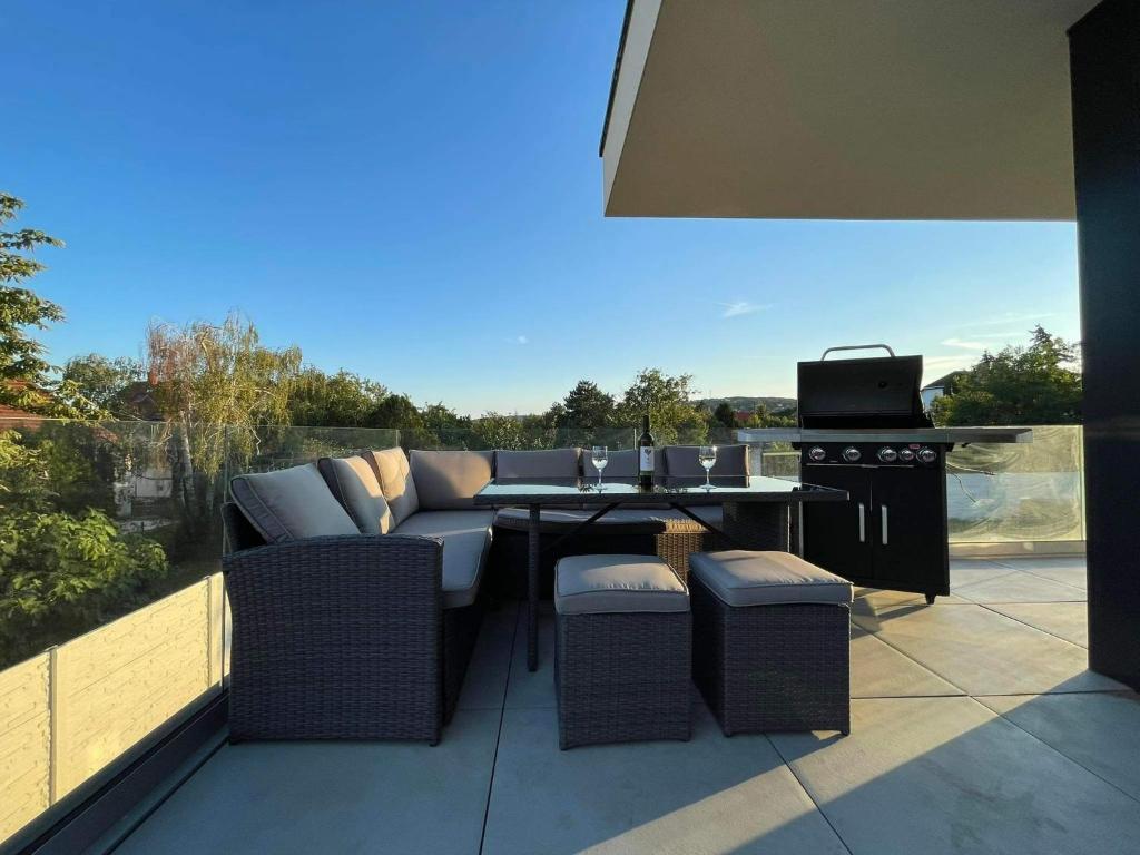 Część wypoczynkowa w obiekcie Luxury Apartments in Balatonalmádi, Almádi Lux Apartman II - Crystal White