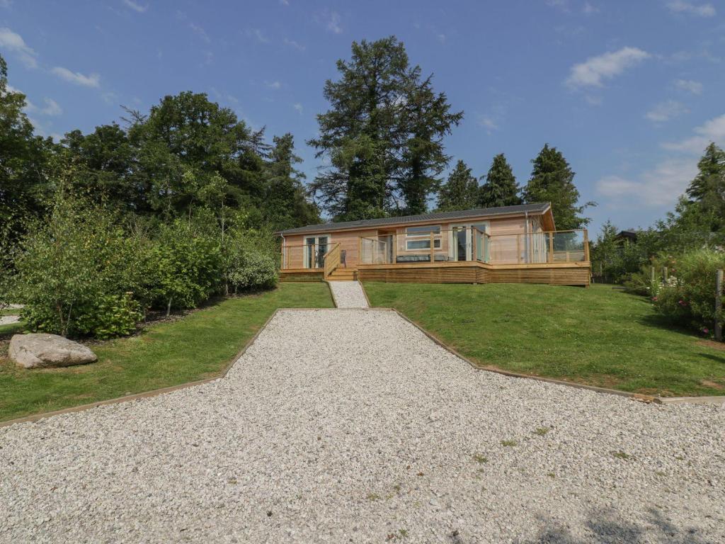 a home with a large yard with a house at 2 Faraway Fields in Liskeard