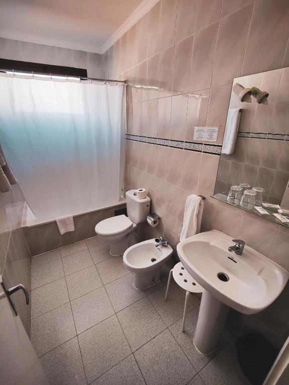 Kúpeľňa v ubytovaní Hotel Olympia