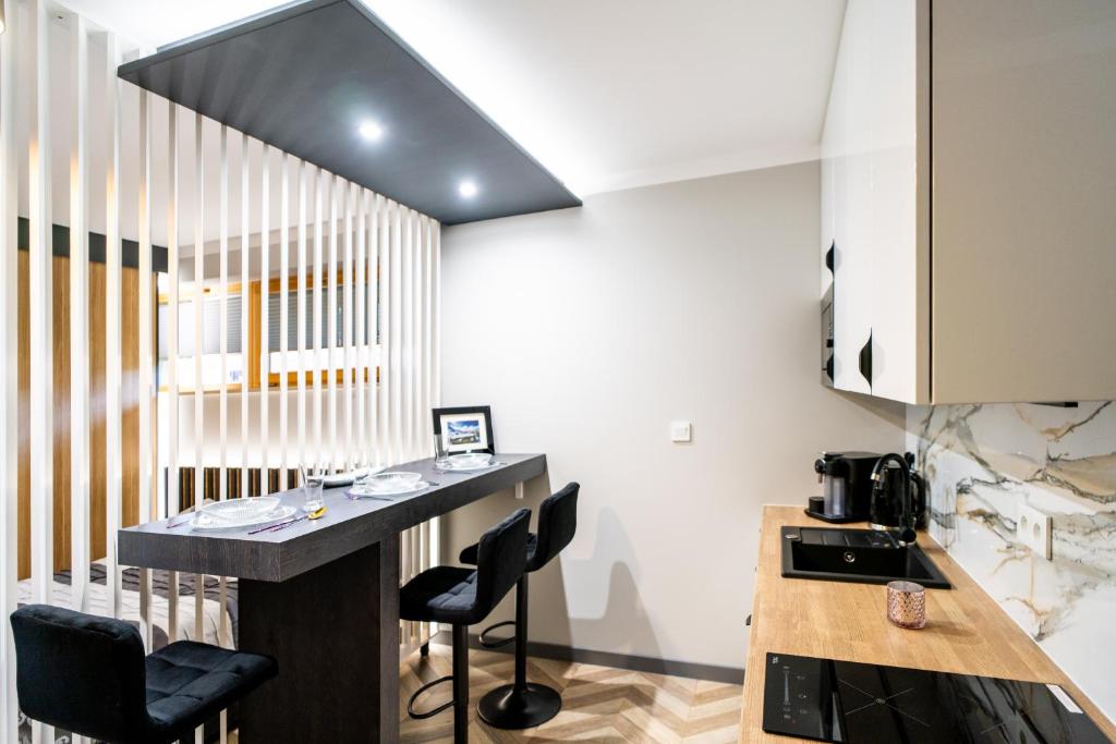 Kuchyňa alebo kuchynka v ubytovaní Apartament Adasiowa Polana by Apart Concept Podhale