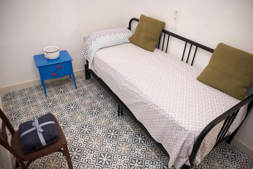 Postel nebo postele na pokoji v ubytování El mas allà