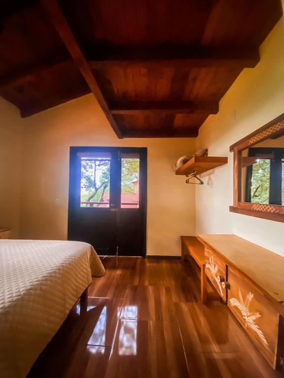Postel nebo postele na pokoji v ubytování Cabaña La Esperanza