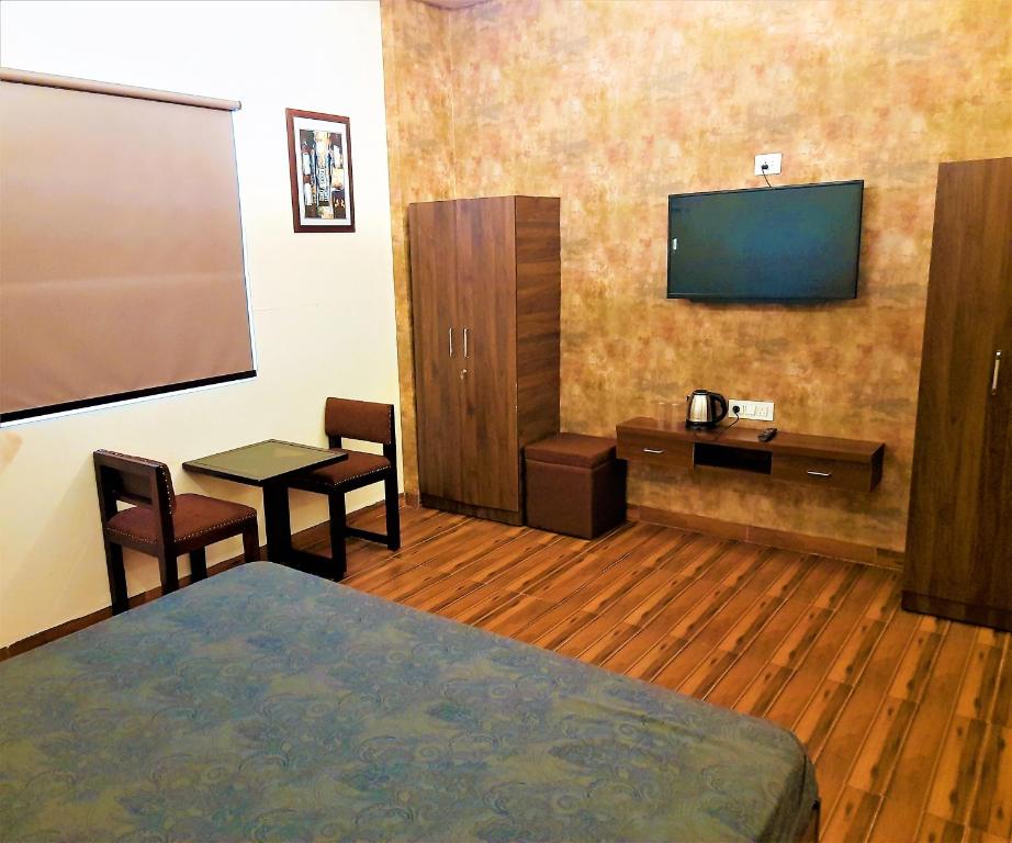 TV a/nebo společenská místnost v ubytování Stovehouse Inn
