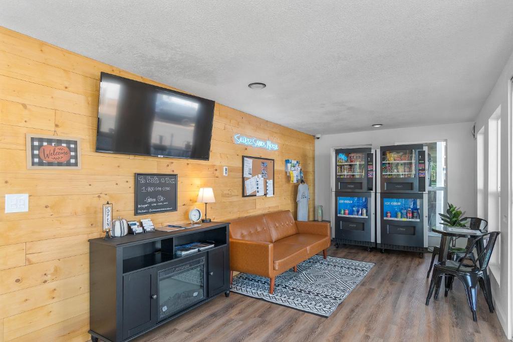 Kuchyň nebo kuchyňský kout v ubytování Silver Sands Motel