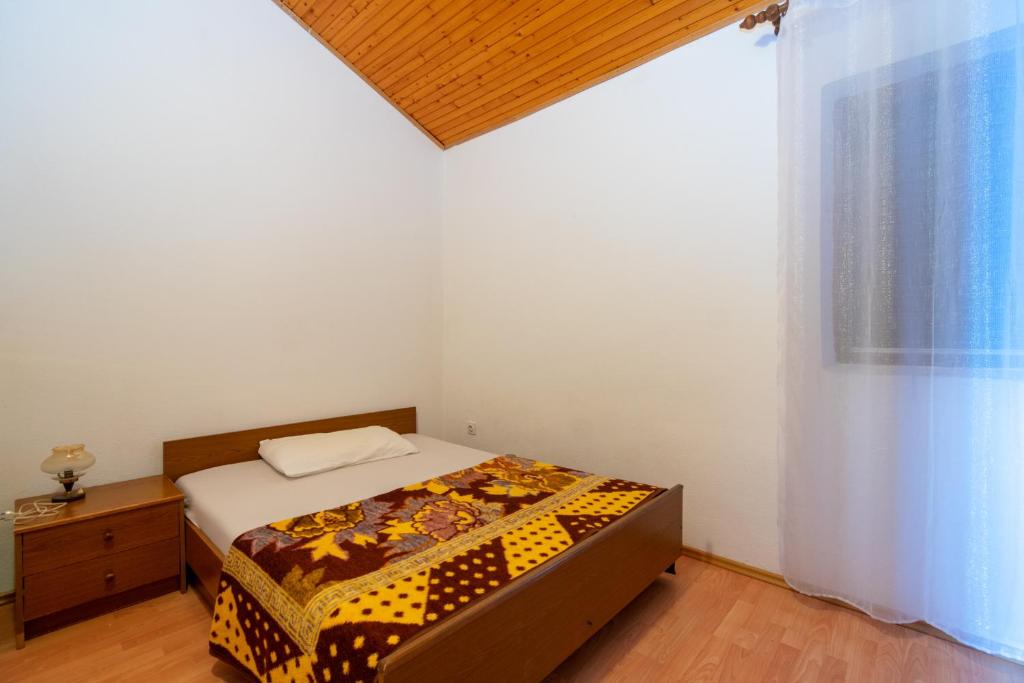 Posteľ alebo postele v izbe v ubytovaní Apartment Mandre 4101a