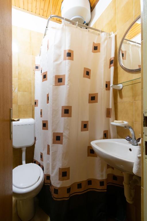 Kúpeľňa v ubytovaní Apartment Mandre 4101a