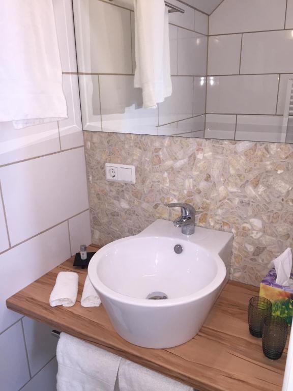 Koupelna v ubytování Hotel Achilles