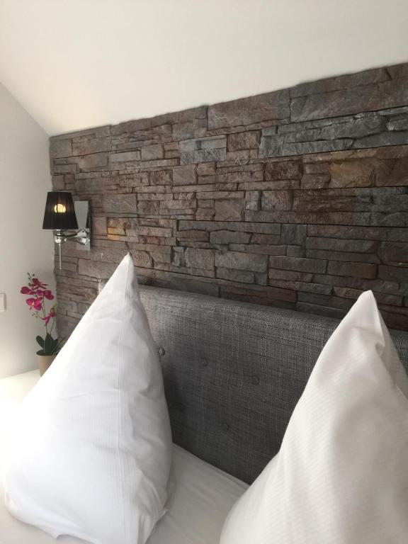 Postel nebo postele na pokoji v ubytování Hotel Achilles