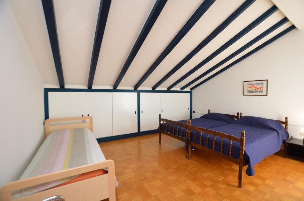 Łóżko lub łóżka w pokoju w obiekcie Apartment Reno