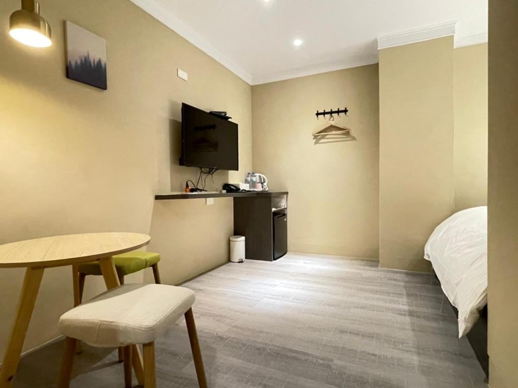 Kuchyň nebo kuchyňský kout v ubytování Yoshi Hotel - Tainan Station Branch