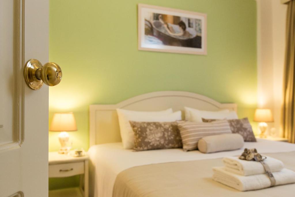 Postel nebo postele na pokoji v ubytování Agrimia Holiday Apartments