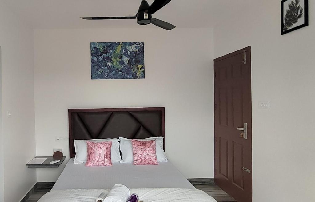 Llit o llits en una habitació de Dune Homestay