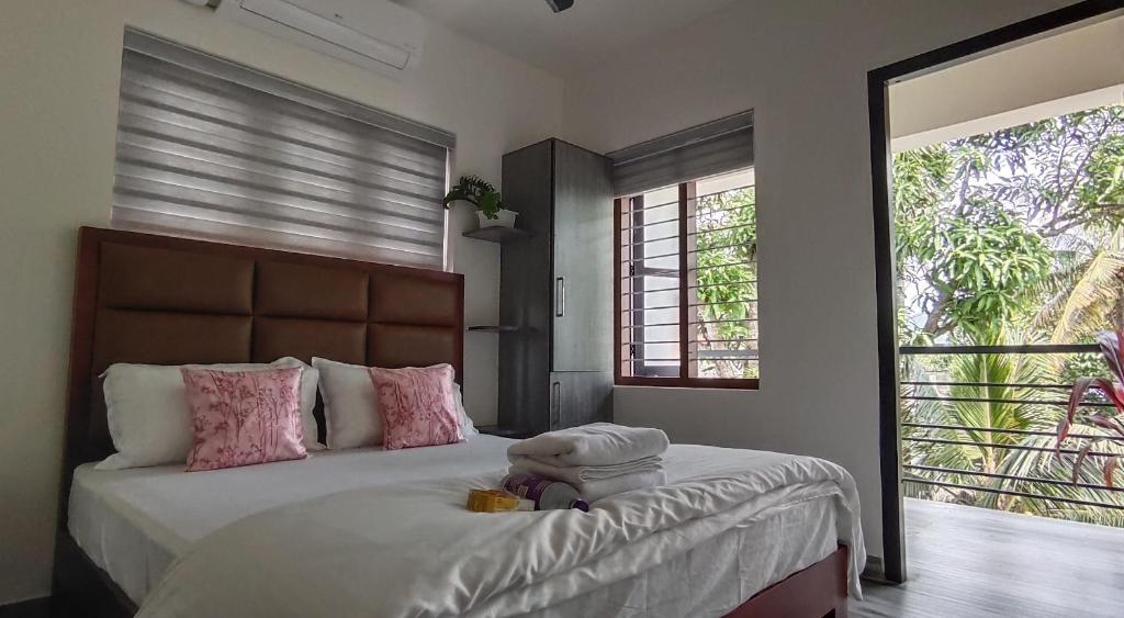 Llit o llits en una habitació de Dune Homestay
