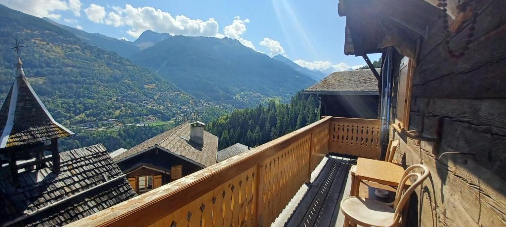 a balcony with a view of a mountain at 2 bedroom chalet with a mountain view in Saint-Jean