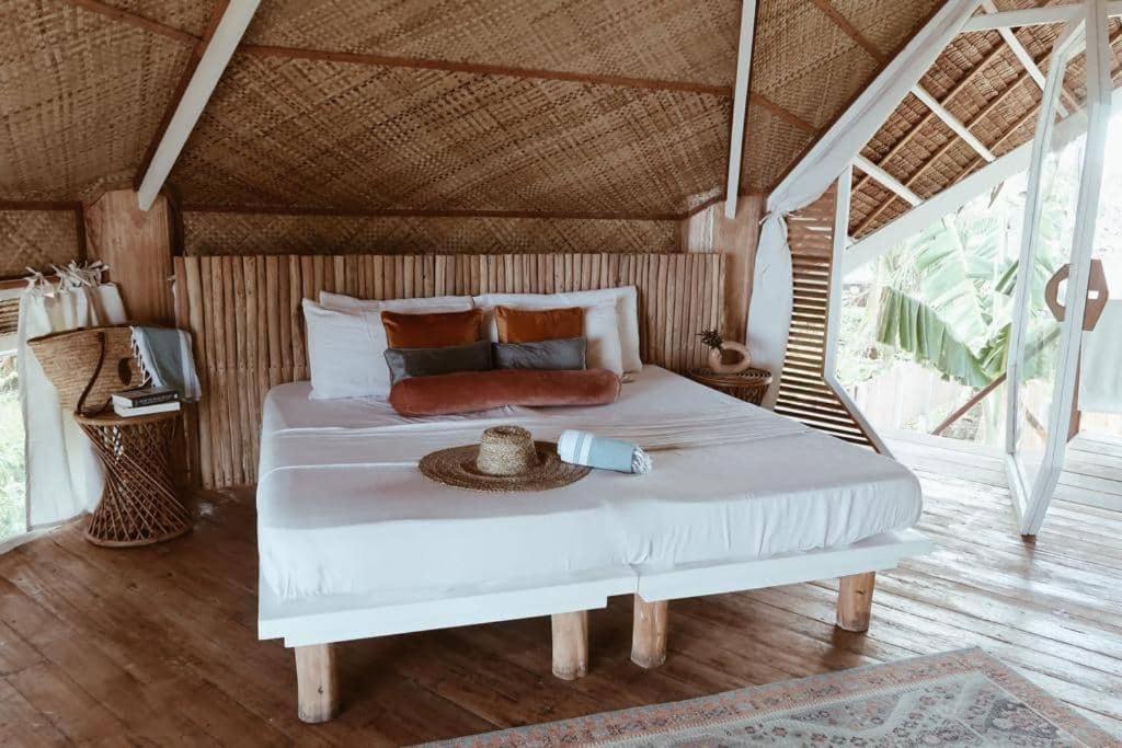Postel nebo postele na pokoji v ubytování Punta Punta Surf Retreat