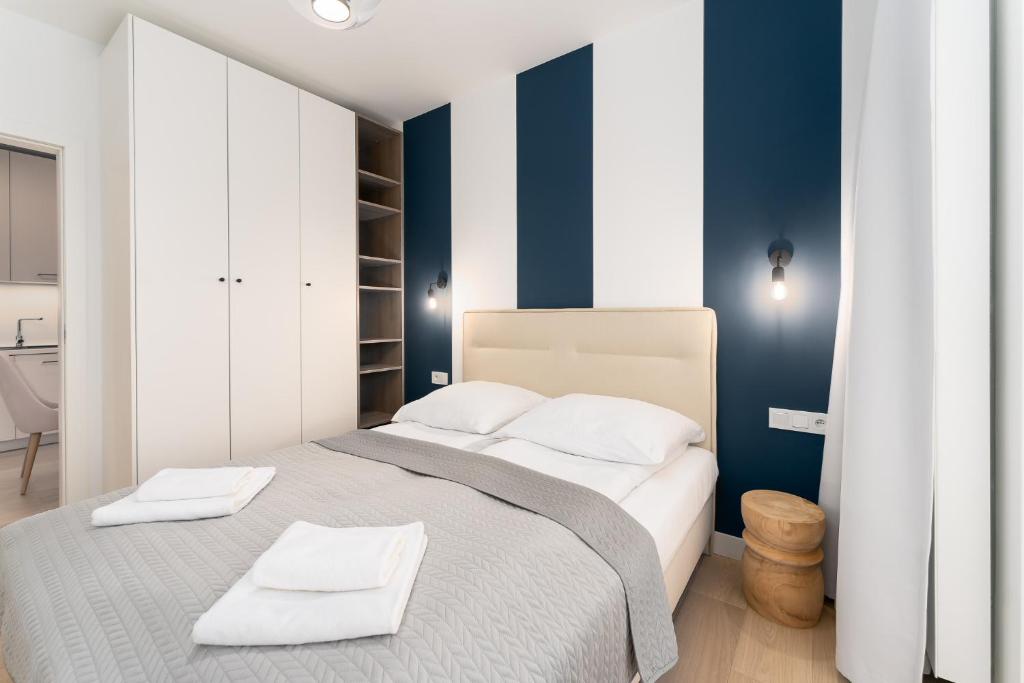 Posteľ alebo postele v izbe v ubytovaní FARO Apartamenty Polanki Aqua 4 BASENY w cenie POOLS im Preis