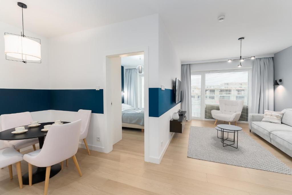 Posteľ alebo postele v izbe v ubytovaní FARO Apartamenty Polanki Aqua 4 BASENY w cenie POOLS im Preis