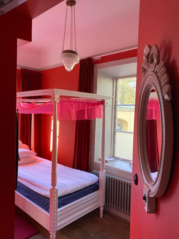 Postel nebo postele na pokoji v ubytování Hotel Hellstens Malmgård