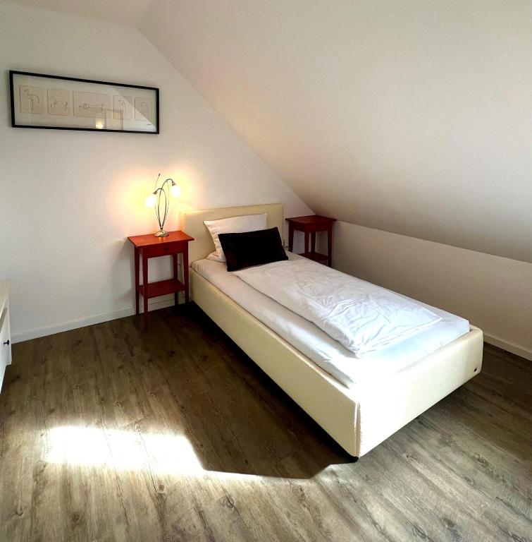 Postel nebo postele na pokoji v ubytování Reibersdorfer Hof