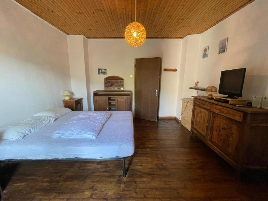 Posteľ alebo postele v izbe v ubytovaní Casa vacanza Pegrini nel centro storico di Gavi